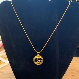 Gucci Gold Zipper Pull Charm on an 18” Unbranded Snake Chain